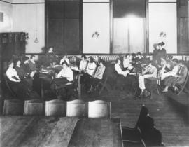 Photograph of two dressmaking classes