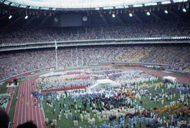 Photograph of the opening day ceremony and the torchbearers