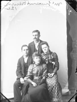 Photograph of four unidentified people