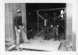 Photograph of workmen at the Arts & Administration Building construction site