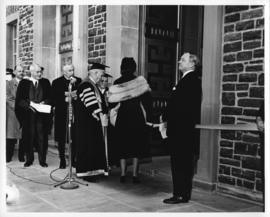 Photograph of Chancellor C.D. Howe and Lady Dunn entering the Sir James Dunn building