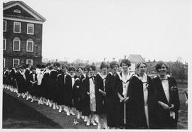 Photograph of a procession of graduates