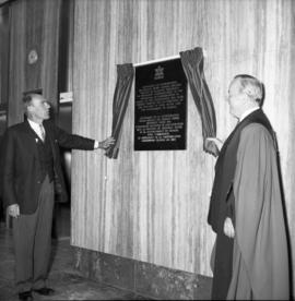 Photograph of Robert Stanfield and an unidentified person unveiling a plaque