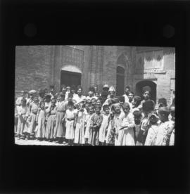 Photograph of children inside an unidentified building