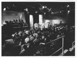 Photograph of a CBC performance at the F. H. Sexton Memorial Gymnasium