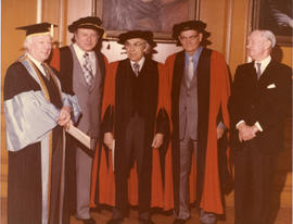 Photograph of Henry Hicks and four unidentified people at a special convocation