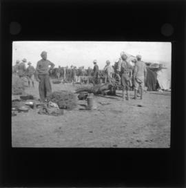 Photograph of unidentified soldiers and people