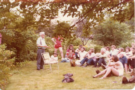 Photograph of George MacEachern addressing a seated crowd at the First Roscoe Fillmore Memorial P...