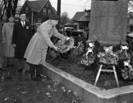 Veteran laying wreath at Remembrance Day ceremony at World War One Cenotaph in Carmichael Park, N...