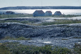 Photograph of the tundra and houses near Fort Chimo, Quebec