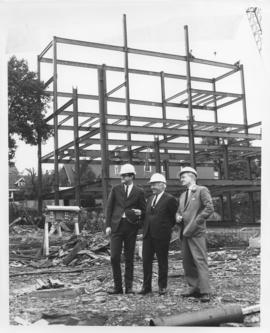 Photograph of Dennis Ashworth, Henry Hicks, and Donald McInnes at the Student Union Building cons...