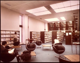 Photograph of the first floor stacks and reading room in the W.K. Kellogg Health Sciences Library