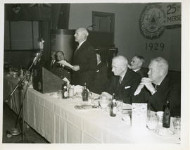 Photograph of Thomas Head Raddall making an address at the 25th anniversary dinner of the Mersy P...