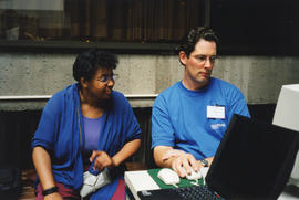 Photograph of James Boxall demonstrating the Libraries' electronic services and products at the K...