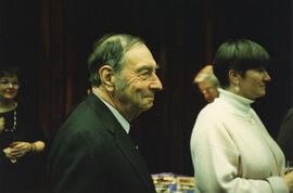 Photograph of two guests at Charles Armour's retirement party