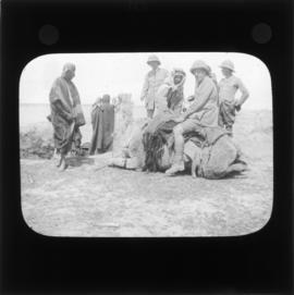 Photograph of unidentified soldiers and a group of people