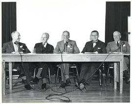 Photograph of five people at miscellaneous health-related event