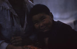 Photograph of a smiling boy in Cape Dorset, Northwest Territories