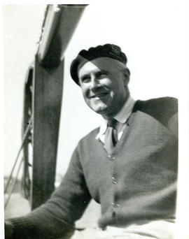 Photograph of Thomas Head Raddall aboard the yacht Ripple