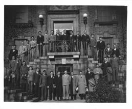 Photograph of a class of medicine students on the front steps of the Public Health Clinic
