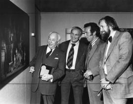 Photograph of Henry Hicks and guests at the Svoboda exhibit reception