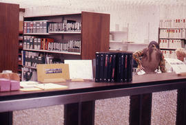 Photograph of the W.K. Kellogg Library behind the Circulation Desk