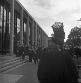 Photograph of the Dalhousie mace being carried to the Dalhousie medical centennial convocation ce...