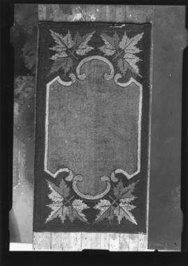 Photograph of a hooked rug commissioned by Mr. Frank Garrrett