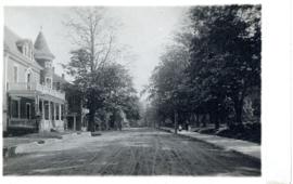 Photograph of Main Street looking east, Liverpool, Nova Scotia printed on a postcard
