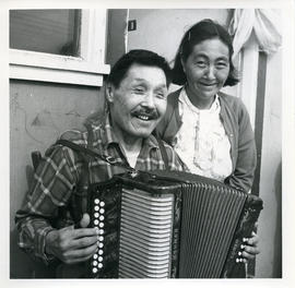 Photograph of Jimmy Koneak and his wife with an accordion