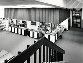 Photograph of the Circulation Desk in the W.K. Kellogg Library - taken from top of staircase