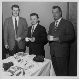 Photograph of Eastern Electric and Supply Company equipment installers Gordon Mills, Bernie James...