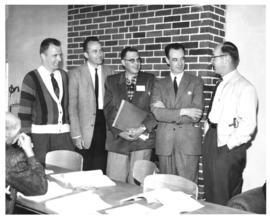 Photograph of five men at miscellaneous unknown health-related event
