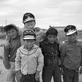Photographs of five boys standing together in Fort Chimo, Quebec