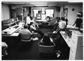 Photograph of a group of students in the television control room.