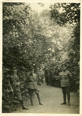 Three officers in the garden