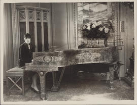 Ellen Ballon sitting at an ornate piano in London, England