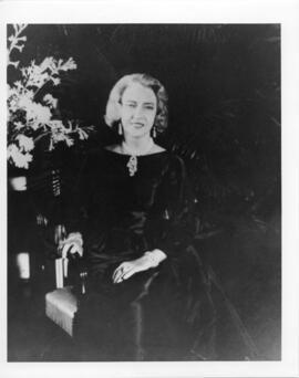 Three photographs and a photographic negative of Dorothy Killam