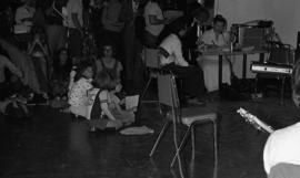 Photograph of children at a CBC radio broadcast  on the ground floor of the Dalhousie Student Union