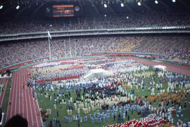 Photograph of the opening day ceremony with the Olympic flame