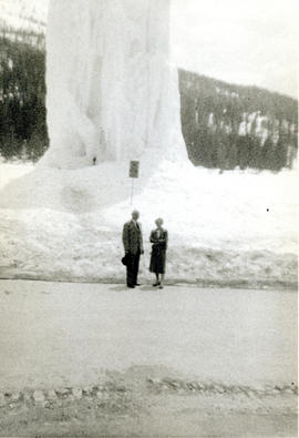 Photograph of Thomas Head and Edith Raddall in front of a frozen fountain in the Dolomites, Italy