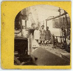 Photograph of three Indigenous people on board the Dayspring