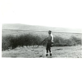 Photograph of Thomas Head Raddall hunting pheasants in the marshes at Port Royal, Upper Granville