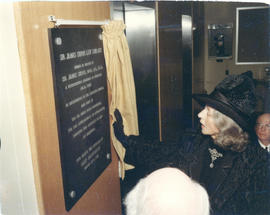 Photograph of Lady Beaverbrook unveiling a plaque in honour of Sir James Dunn