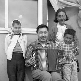 Photograph of Jimmy Koneak, his wife, and two children in Fort Chimo, Quebec