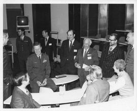 Photograph of Michael Kirby, Michael McGwire, Henry Hicks, and others at the NORAD headquarters