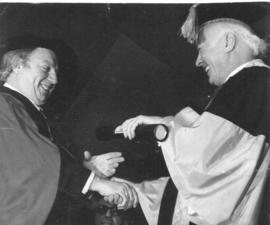 Photograph of Henry Hicks conferring an honorary degree on Isaac Stern