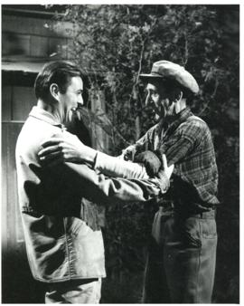 Photograph of "Neil" (James Doohan) and "Indian Johnnie" (Eric Clavering) greeting one another