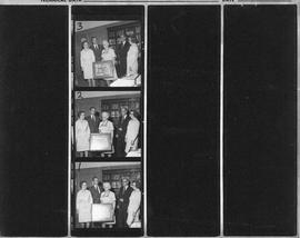 Proof sheet of photographs of the presentation of a picture to Mrs. Stoker