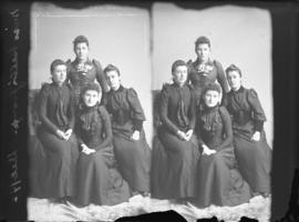 Photograph of Miss Bell and unknown individuals